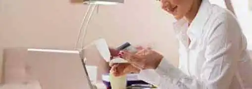 Female Business Owner with Credit Card