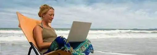 Small Business Owner Working Remotely While on Vacation